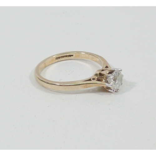 81 - A solitaire ring, 9ct gold set with a Cubic Zirconia.  Stone approx 5mm diameter.