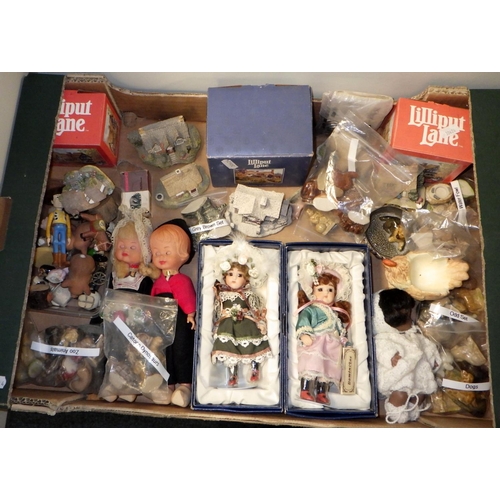 319 - Two boxes of various collectables to include Wade Whimsies,  badges, dolls, Liliput lane, (2)