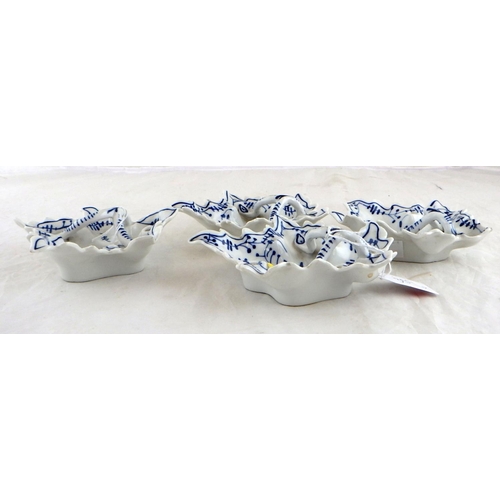 357 - Four leaf-shaped pickle dishes, hard-paste having blue and white painted decoration. a/f