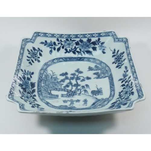 550 - A Chinese squared porcelain dish decorated with underglaze blue and white design incorporating a lan... 