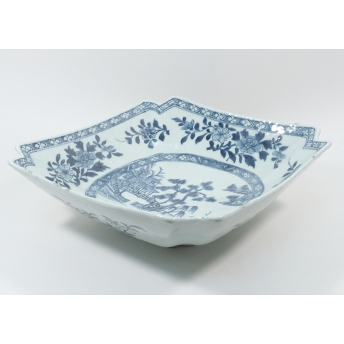 550 - A Chinese squared porcelain dish decorated with underglaze blue and white design incorporating a lan... 