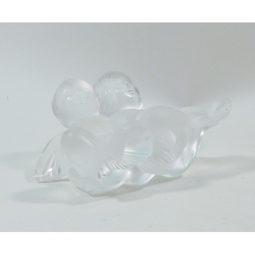 140 - A Lalique girl & boy angel paperweight, a/f chipped.  82mm tall.