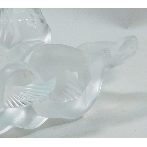 140 - A Lalique girl & boy angel paperweight, a/f chipped.  82mm tall.