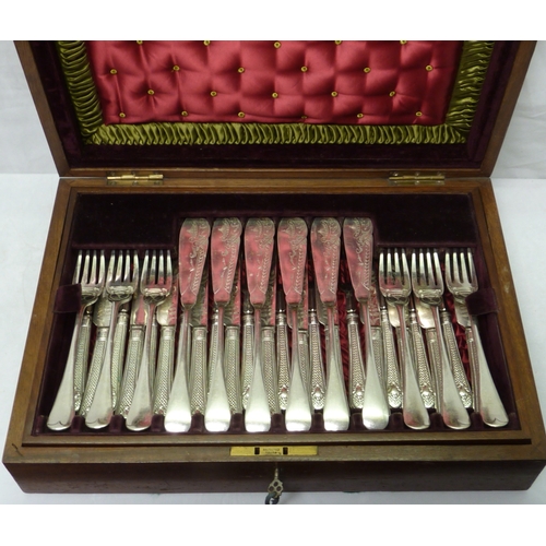 105 - An inlaid fitted case containing a set of six silver plated fish knives and forks and a set of twelv... 