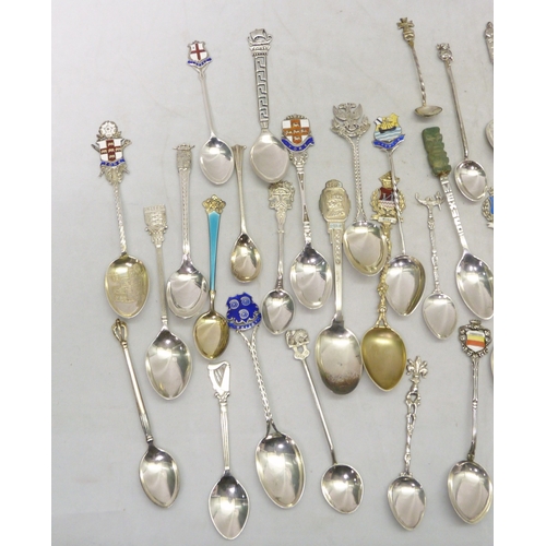 108 - A collection of silver, white metal and silver plated souvenir teaspoons, etc.  200gr weighable.