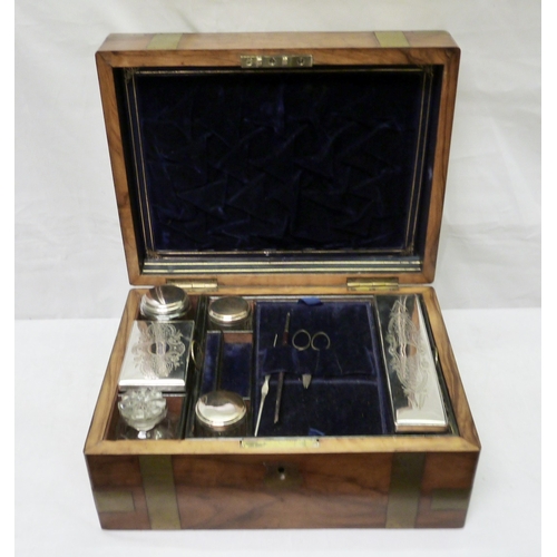 125 - A walnut brass bound fitted vanity / writing box