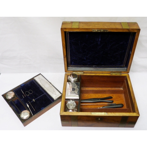 125 - A walnut brass bound fitted vanity / writing box