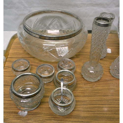 47 - A collection of silver rimmed cut glass bowls, salts and vases.