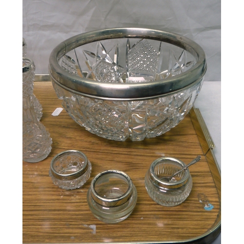 47 - A collection of silver rimmed cut glass bowls, salts and vases.