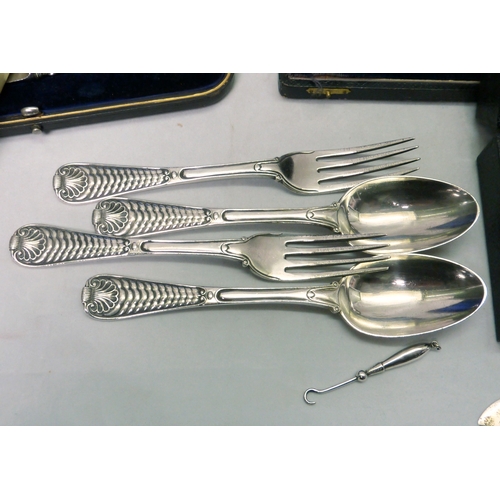 8 - Victorian silver cutlery comprising a pair of silver dessert forks and a matching pair of silver des... 