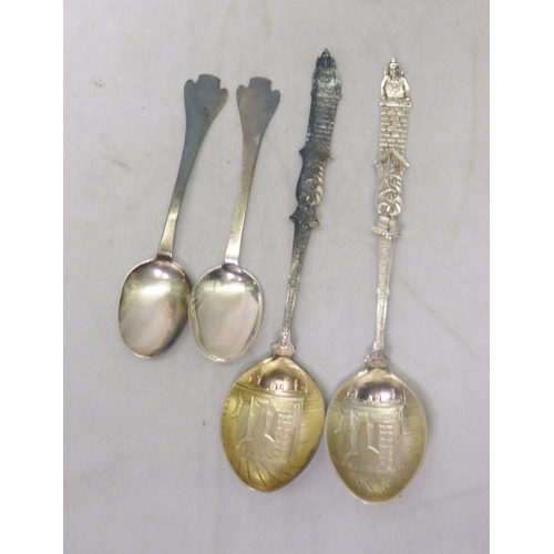 99 - Three matching Georg Jensen silver coffee spoons; a cased silver coronation anointing spoon; a pair ... 