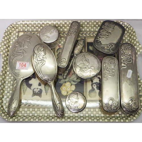 104 - A German Art Nouveau silver plated dressing table set (10)