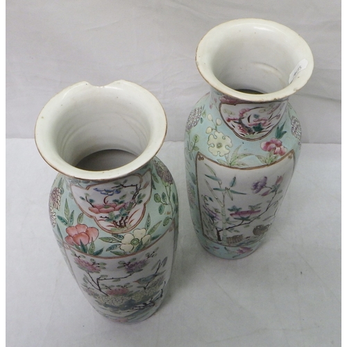 560 - A pair of Oriental vases on hardwood stands AF 30cm tall without bases