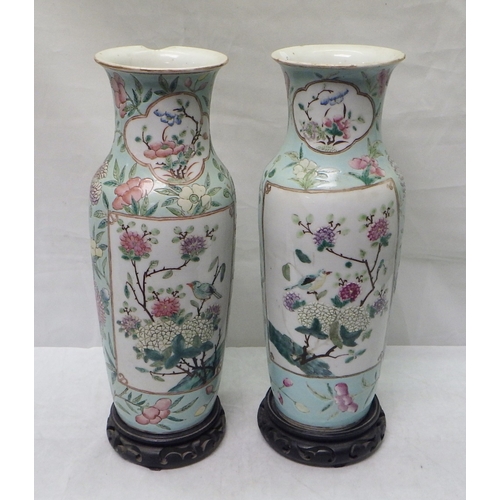 560 - A pair of Oriental vases on hardwood stands AF 30cm tall without bases