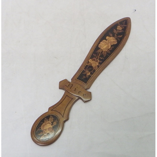 561 - An inlaid olive wood page turner 28cm