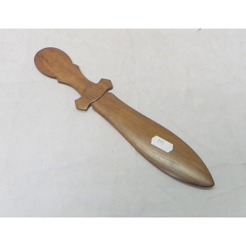 561 - An inlaid olive wood page turner 28cm