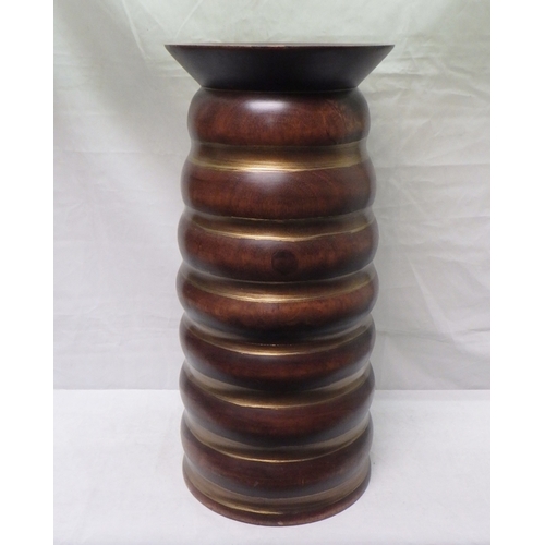 563 - A wooden ribbed stick stand 53cm tall