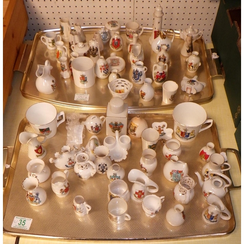 35 - Two trays of approx 60 pieces of crested china