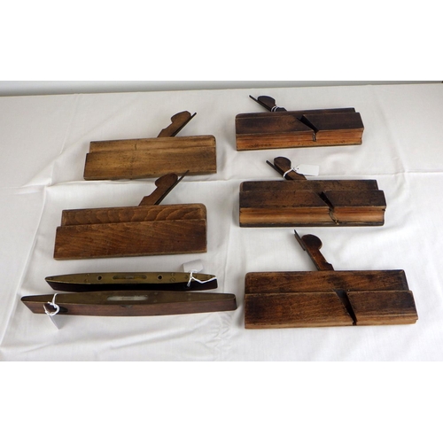 6 - Five 19thC Moulding Planes together with two spirit levels (7)