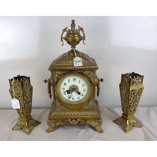 9 - An early 20th C brass mantle Japy Freres mantle clock together with a pair of associated pierced bra... 