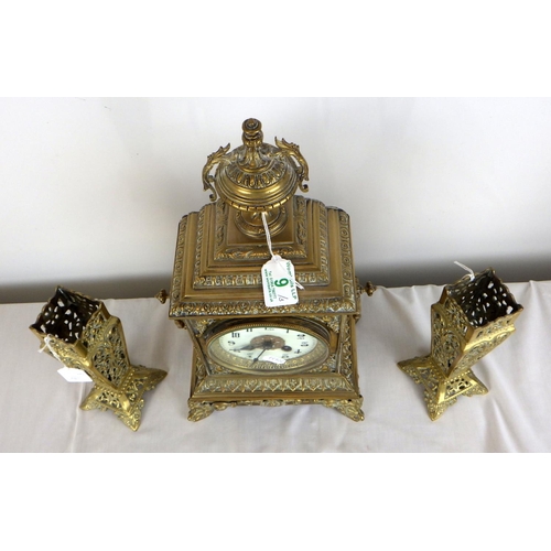 9 - An early 20th C brass mantle Japy Freres mantle clock together with a pair of associated pierced bra... 