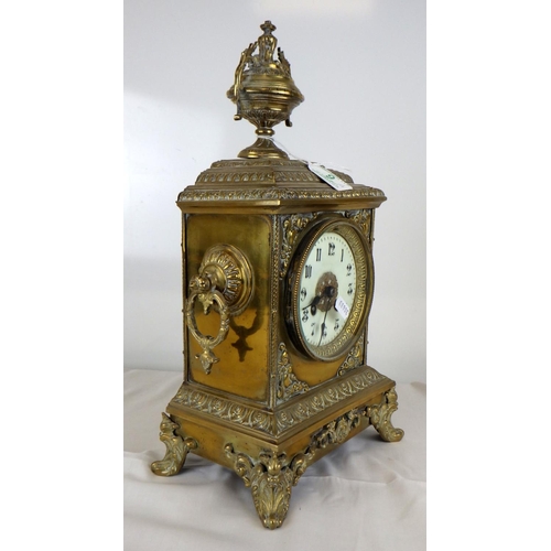 9 - An early 20th C brass mantle Japy Freres mantle clock together with a pair of associated pierced bra... 