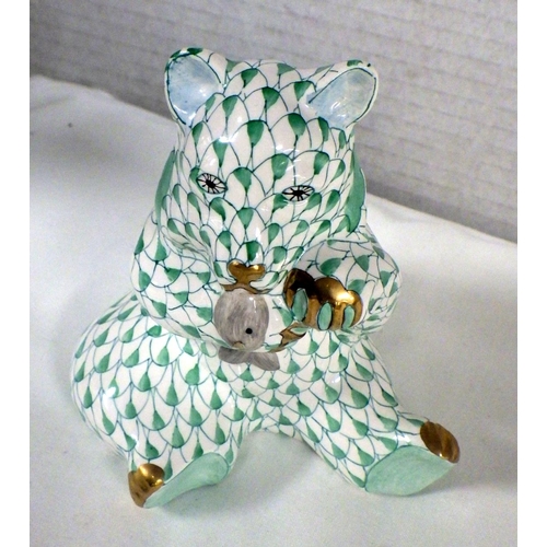 114 - A Herend green fishnet Bear with Salmon 10cm tall