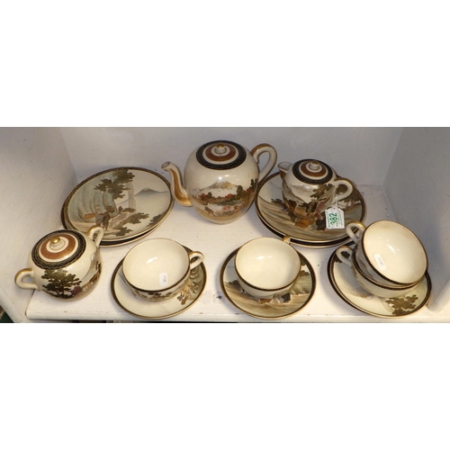 29 - A Satsuma part tea set to include tea pot, sugar bowl, four side plates and four cups & saucers