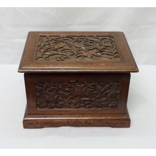 34 - An Oriental motif tea caddy, carved hardwood with a pewter liner.