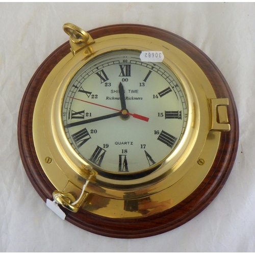 17 - A maritime style wall clock having a quartz movement, modern.