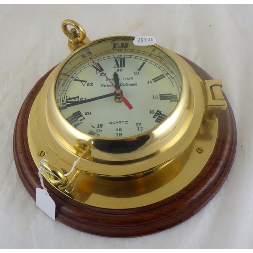 17 - A maritime style wall clock having a quartz movement, modern.