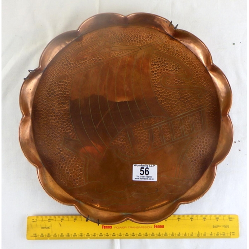 56 - An Arts And Crafts copper scalloped edge plate decorated with a ship 34cm diameter