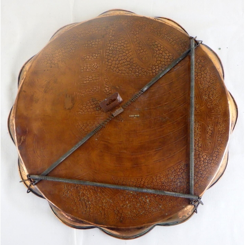 56 - An Arts And Crafts copper scalloped edge plate decorated with a ship 34cm diameter