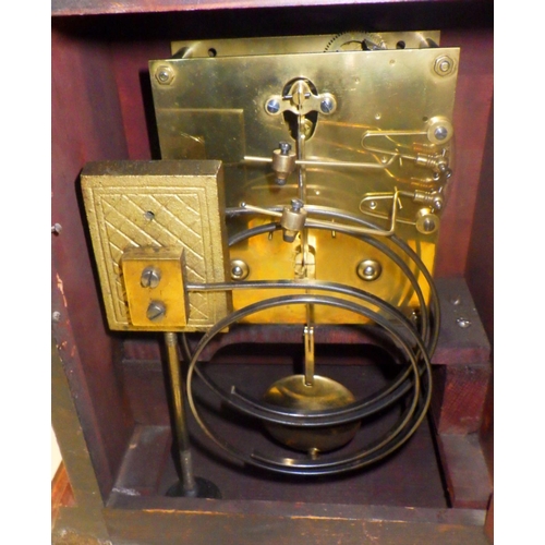 85 - A 19thC striking mantle clock 42cm tall