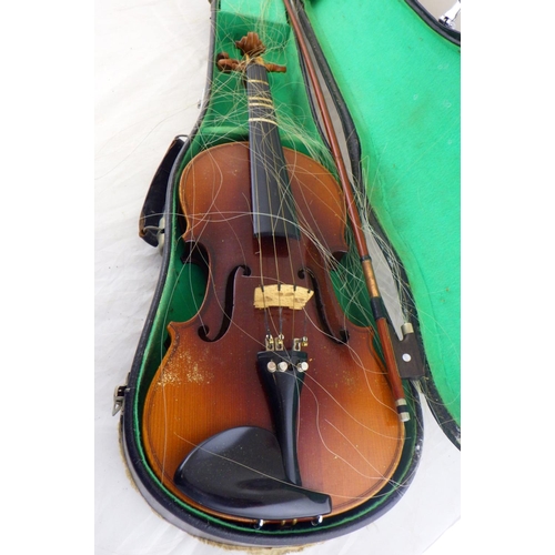 120 - A cased Lark violin & bow