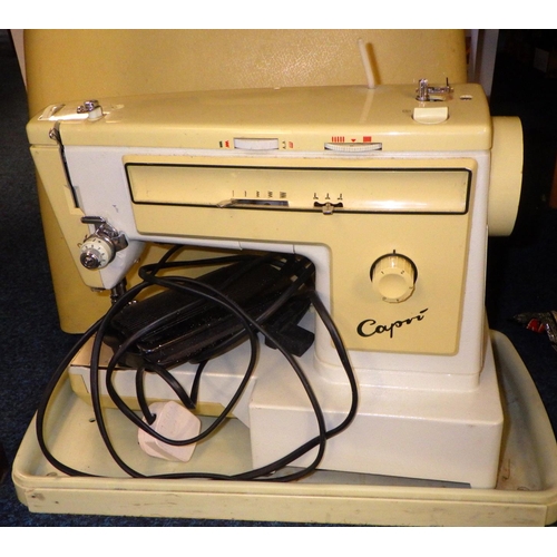 141 - An electric sewing machine, a group of jjgsaws. (2)