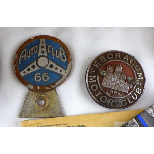 145 - Two motoring interest bumper bar badges; motor rally maps; a stop-watch with dash board attachment, ... 