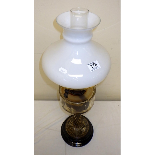 176 - A large oil lamp 70cm tall