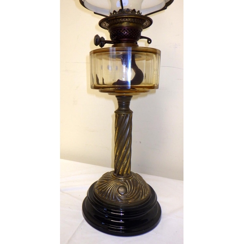 176 - A large oil lamp 70cm tall