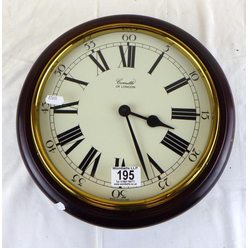 195 - A Comitti battery operated wall clock 33cm diameter