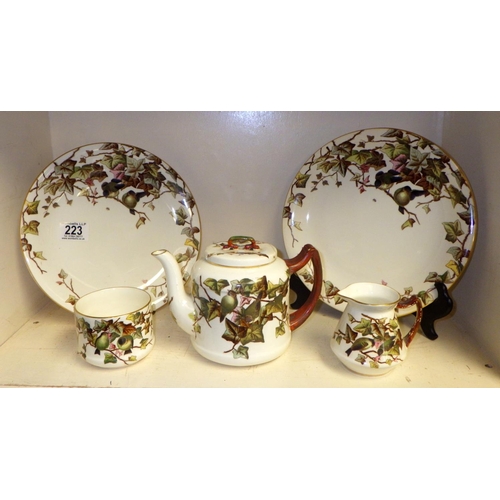 223 - A GJ (George Jones) Aesthetic Ivy Bower part tea set, tea pot lidded as staple repair