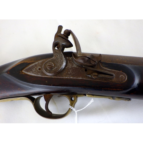 314 - A flintlock blunderbuss having a steel barrel with ring design and turned muzzle, steel lock plate w... 