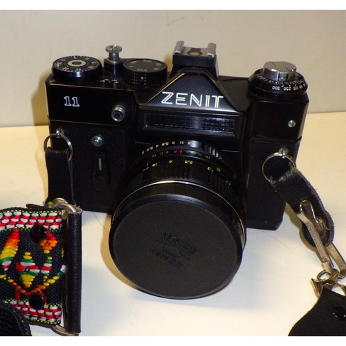 316 - A Zenith 11 35mm slr camera, with lens, gadget bag etc.