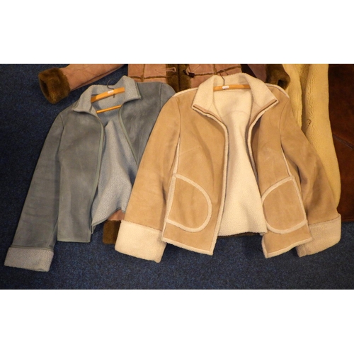 323 - A group of 4 sheep skin coats and a XPT waistcoat (5)