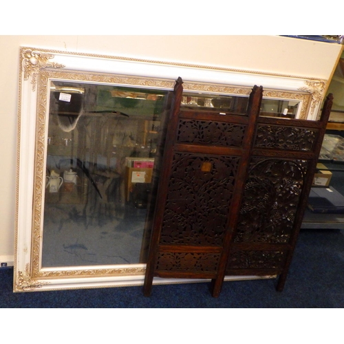 324 - A carved  three fold screen together with a large  bevelled mirror 122 x 97cm (2)