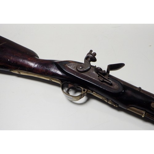 314 - A flintlock blunderbuss having a steel barrel with ring design and turned muzzle, steel lock plate w... 