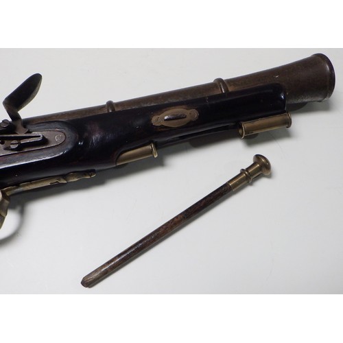 314 - A flintlock blunderbuss having a steel barrel with ring design and turned muzzle, steel lock plate w... 