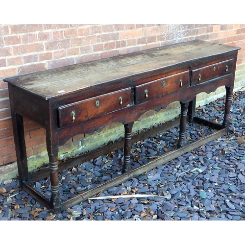 506 - An 18th cen oak dresser base, later stretchers, (a/f), 190cm wide, ex The Retreat (13)