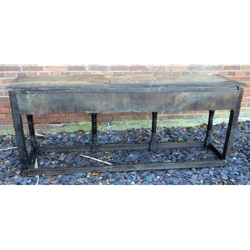 506 - An 18th cen oak dresser base, later stretchers, (a/f), 190cm wide, ex The Retreat (13)