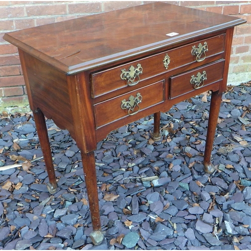 523 - A mahogany lowboy, later top on turned legs with pad feet, a/f veneer damage, 78cm wide, ex The Retr... 